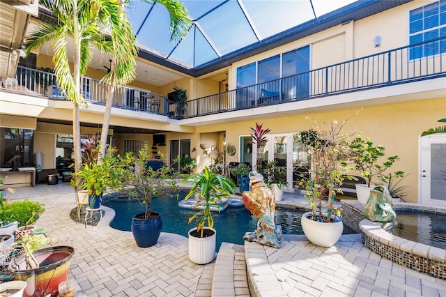 view of patio / terrace featuring a balcony