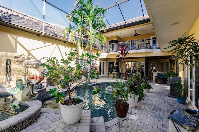 1209 San Mateo Dr, Punta Gorda, FL 33950 - view of patio / terrace with a balcony, ceiling fan, and a lanai