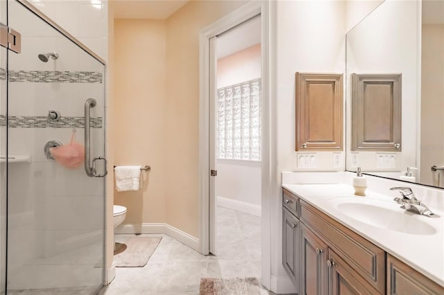 bathroom featuring a shower with door, toilet, tile patterned flooring, and vanity