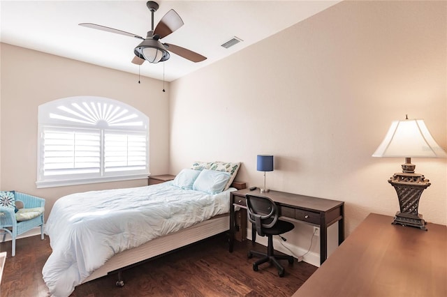 bedroom featuring dark wood-type flooring and ceiling fan