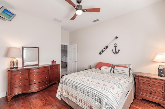 bedroom featuring dark hardwood / wood-style flooring and ceiling fan