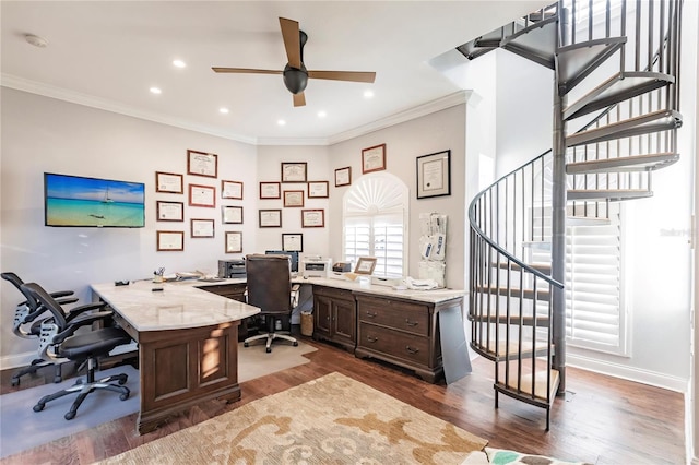 home office with dark wood-type flooring, ceiling fan, and crown molding