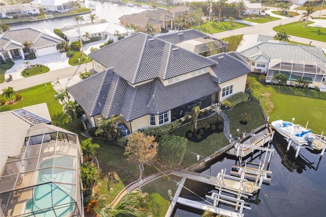 1209 San Mateo Dr, Punta Gorda, FL 33950 - aerial perspective of suburban area with a nearby body of water
