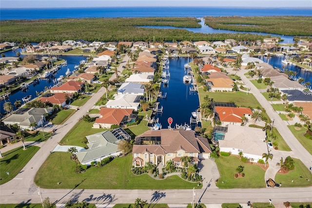 bird's eye view with a water view