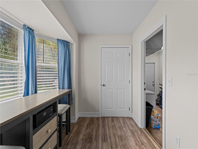 interior space with dark hardwood / wood-style floors