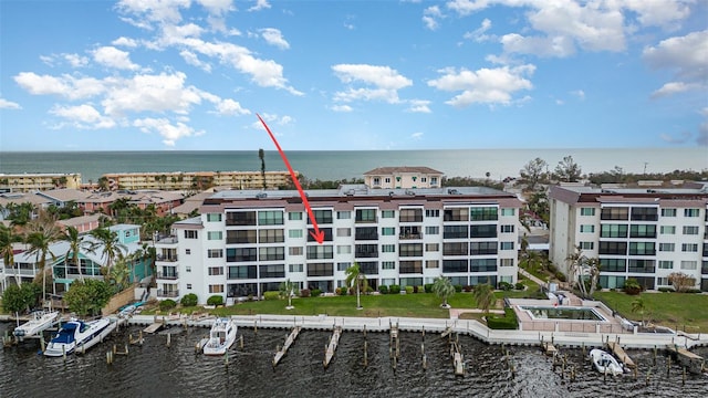 view of building exterior featuring a water view