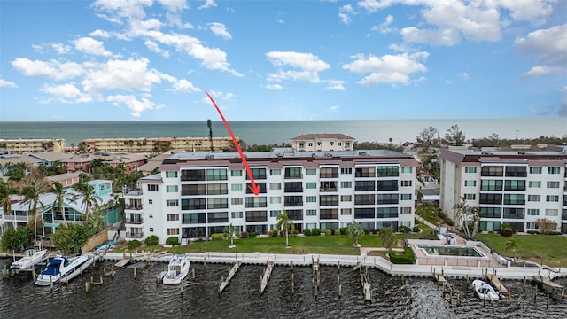 9011 Midnight Pass Rd Unit 329, Sarasota, FL 34242 - view of apartment building / complex with a water view