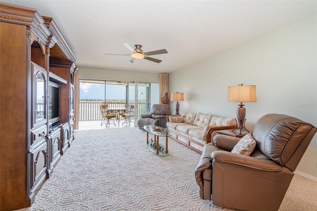 9011 Midnight Pass Rd Unit 329, Sarasota, FL 34242 - living area featuring carpet and a ceiling fan