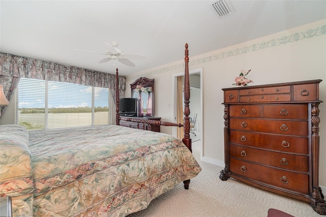 bedroom with light colored carpet and ceiling fan