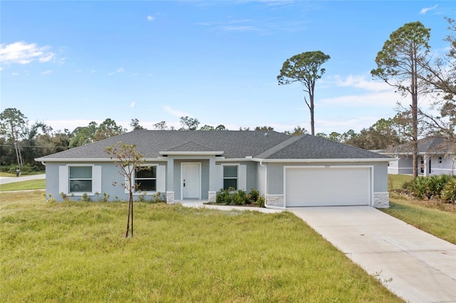 single story home featuring a front yard and a garage