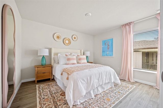 bedroom featuring light wood-type flooring