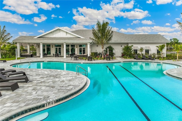 view of swimming pool featuring a patio