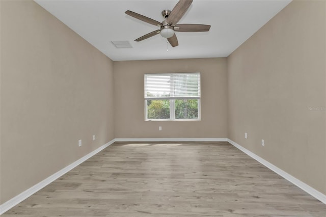 unfurnished room with light hardwood / wood-style floors and ceiling fan