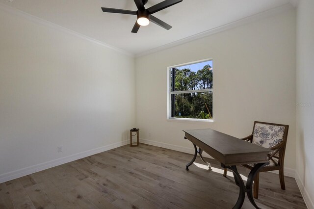 14294 Mcfarland Ave, Port Charlotte, FL 33981 - office space featuring wood finished floors, ceiling fan, crown molding, and baseboards