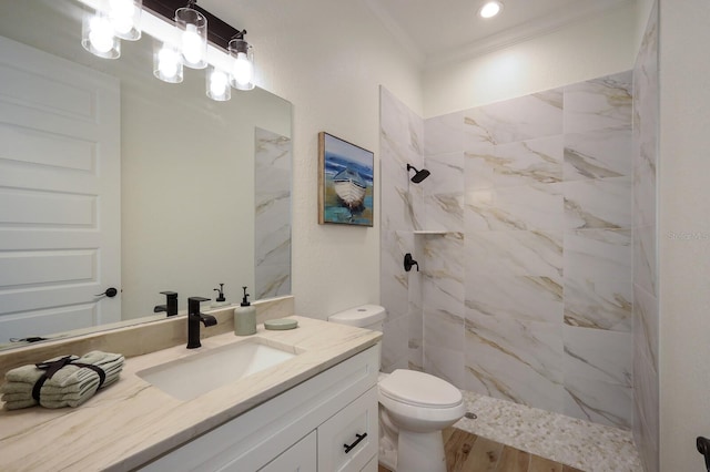 14294 Mcfarland Ave, Port Charlotte, FL 33981 - bathroom featuring toilet, a tile shower, ornamental molding, and vanity
