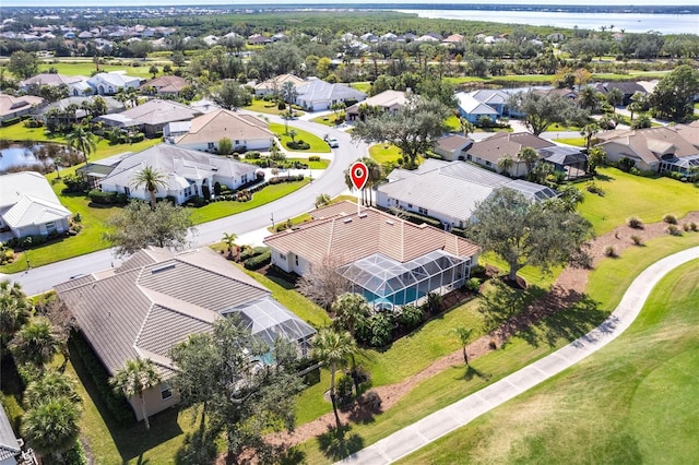 bird's eye view with a water view