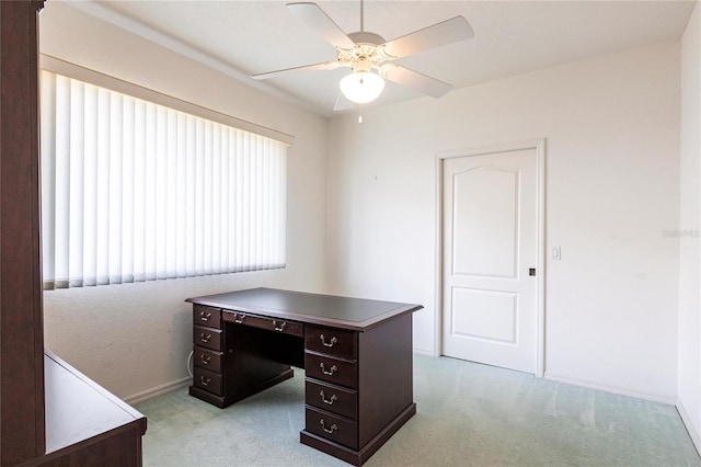 carpeted office with ceiling fan