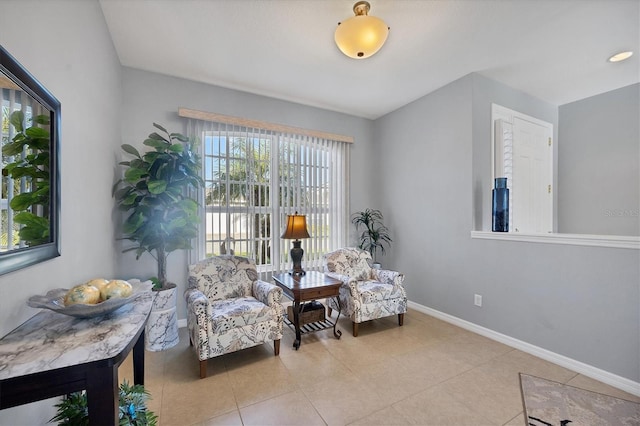 living area featuring light tile patterned floors