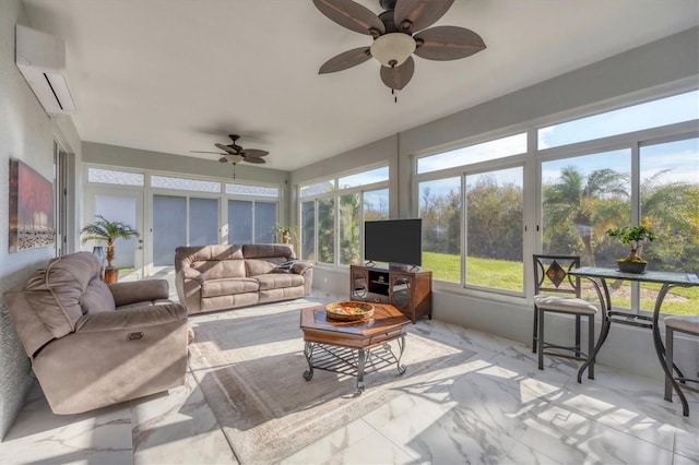 sunroom with a wall unit AC and ceiling fan