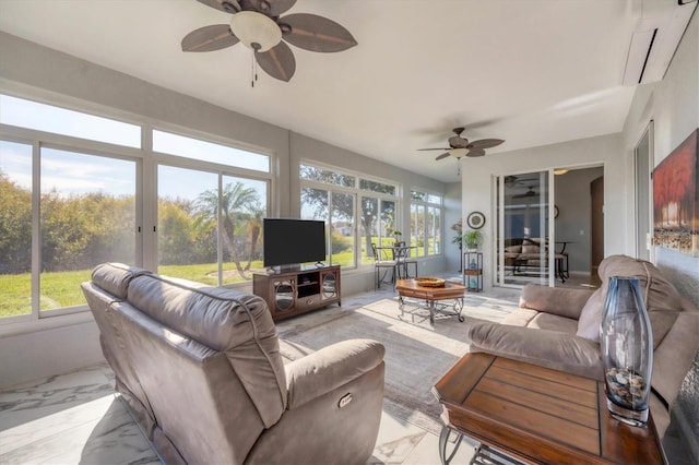 sunroom with ceiling fan