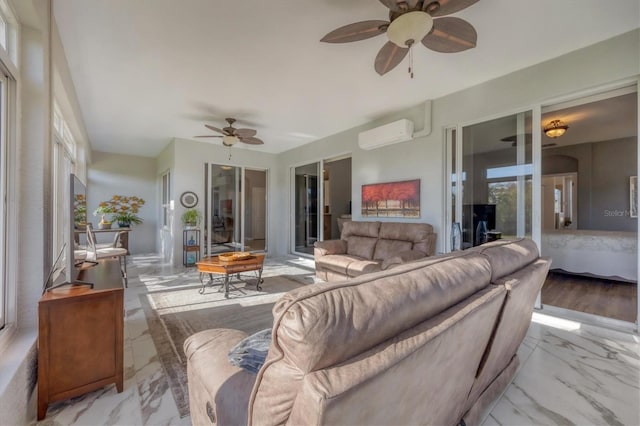 living room with ceiling fan, light hardwood / wood-style floors, and a wall unit AC