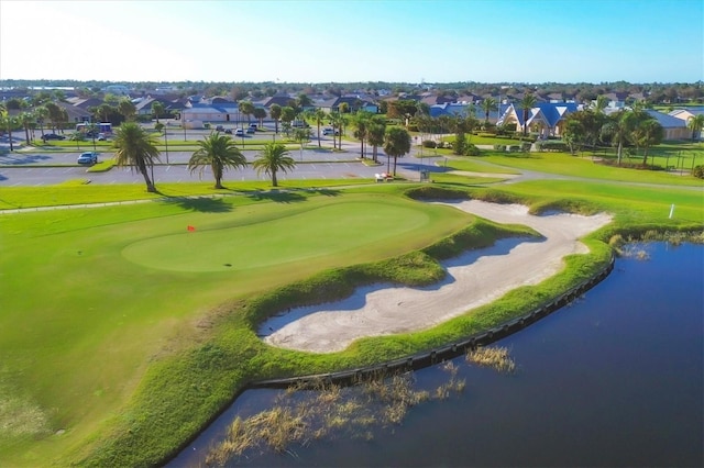 surrounding community featuring a water view