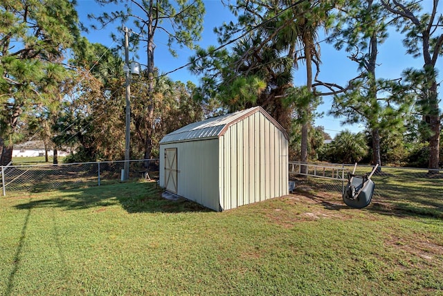 view of outdoor structure featuring a yard