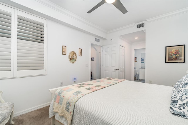 carpeted bedroom with ensuite bath, crown molding, a closet, and ceiling fan