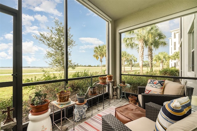 sunroom with a rural view