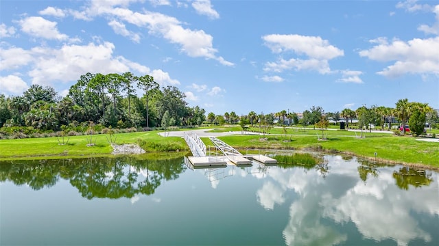 property view of water featuring a boat dock