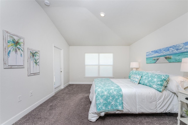 carpeted bedroom with vaulted ceiling