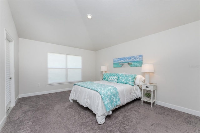 bedroom with carpet and lofted ceiling