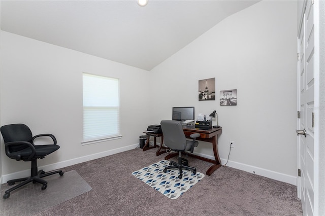 office area with carpet flooring and vaulted ceiling