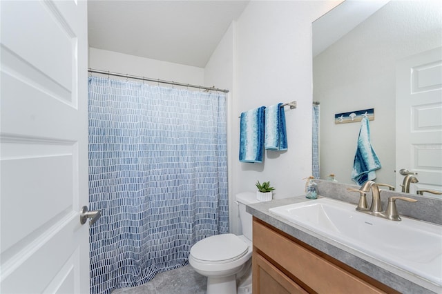 bathroom with vanity, a shower with curtain, and toilet