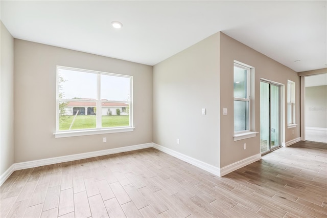 25236 Rampart Blvd, Punta Gorda, FL 33983 - unfurnished room featuring light wood finished floors and baseboards