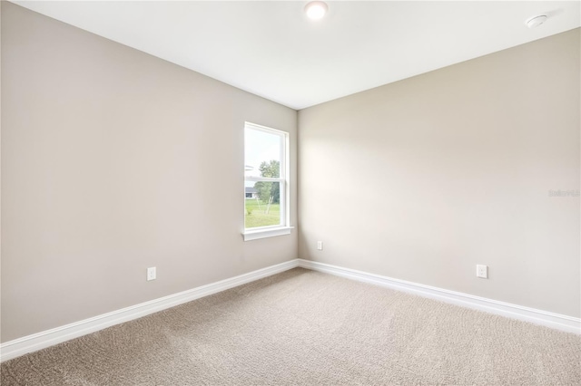 25236 Rampart Blvd, Punta Gorda, FL 33983 - unfurnished room featuring carpet floors and a smoke detector