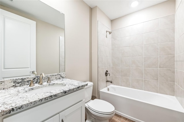25236 Rampart Blvd, Punta Gorda, FL 33983 - full bath with vanity, bathing tub / shower combination, and wood finished floors