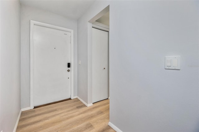 foyer entrance featuring light hardwood / wood-style flooring