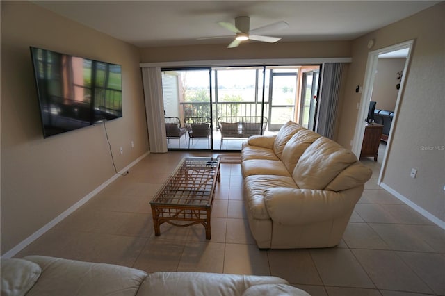 tiled living room featuring ceiling fan