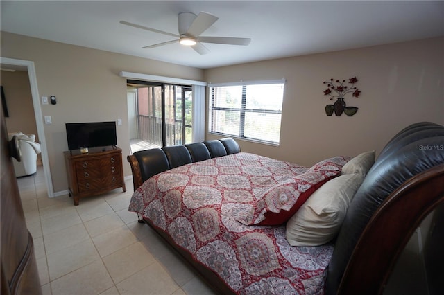 tiled bedroom with ceiling fan