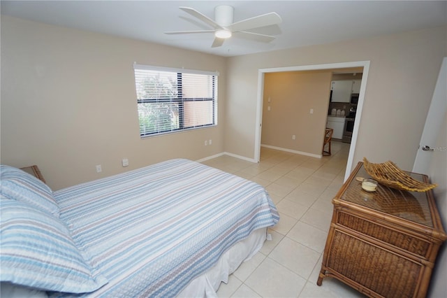 bedroom featuring ceiling fan and light tile patterned flooring