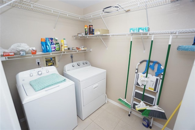 laundry area with independent washer and dryer