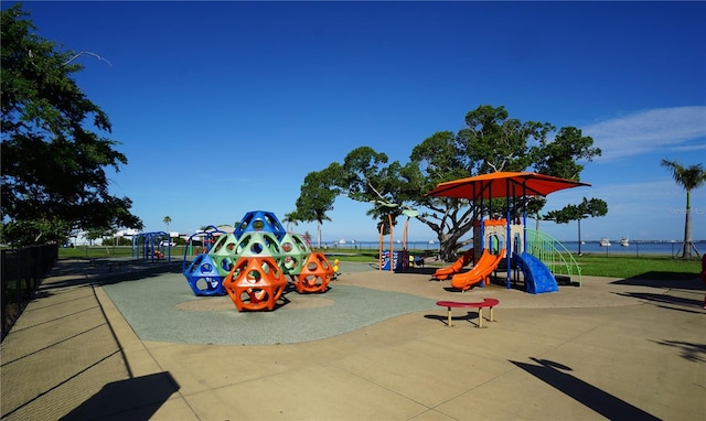 view of playground featuring a water view