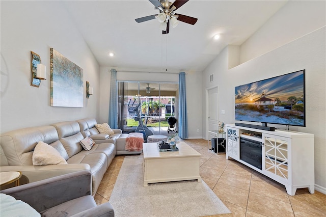 3743 Albacete Cir Unit 84, Punta Gorda, FL 33950 - living area with ceiling fan, lofted ceiling, light tile patterned floors, baseboards, and recessed lighting
