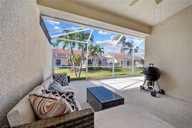 exterior space with lofted ceiling and ceiling fan