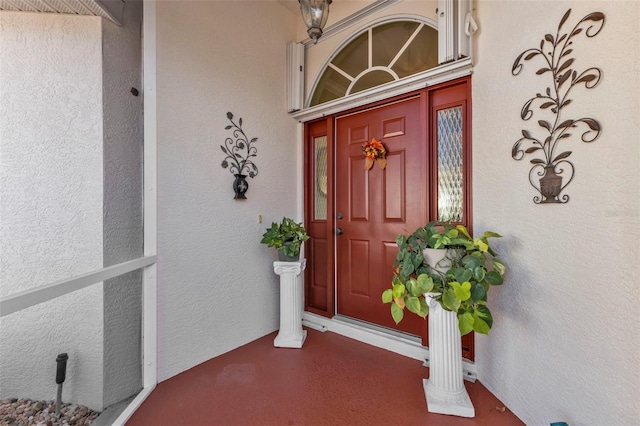 2831 Corinthia Cir, North Fort Myers, FL 33917 - view of exterior entry with stucco siding