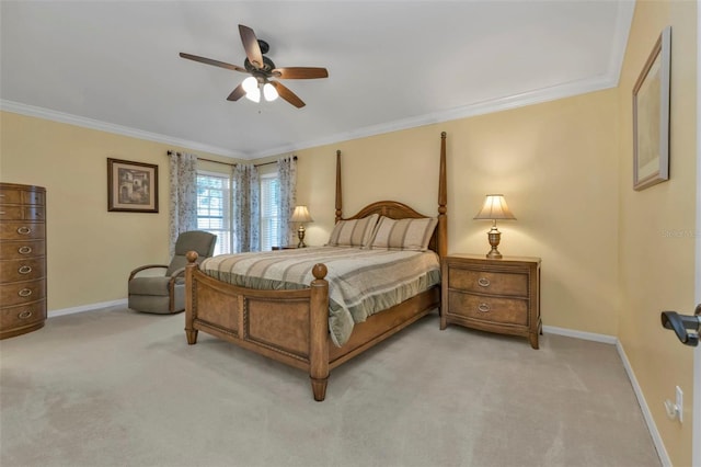 bedroom with ceiling fan, ornamental molding, and carpet floors