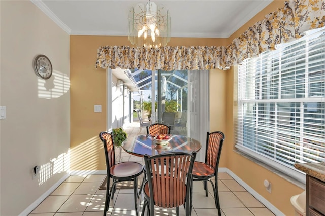 dining space featuring light tile patterned floors, crown molding, a wealth of natural light, and an inviting chandelier