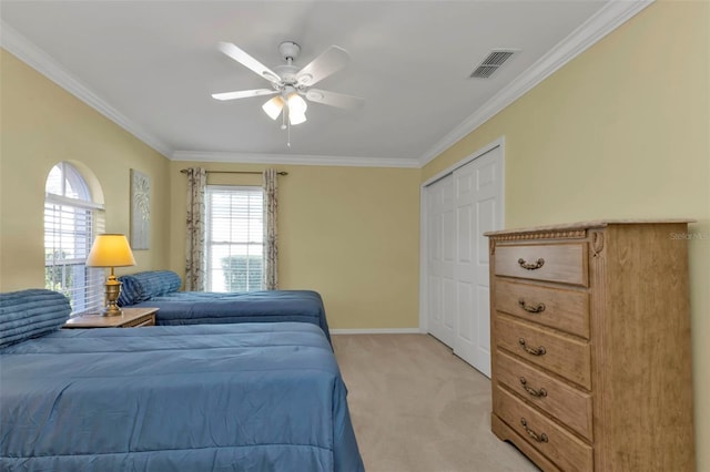 2831 Corinthia Cir, North Fort Myers, FL 33917 - bedroom with light colored carpet, baseboards, visible vents, and ornamental molding