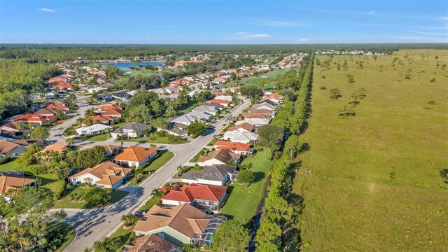 2831 Corinthia Cir, North Fort Myers, FL 33917 - drone / aerial view with a water view and a residential view